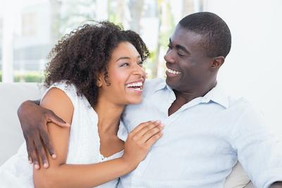Black man and woman smiling at each other, charlotte nc