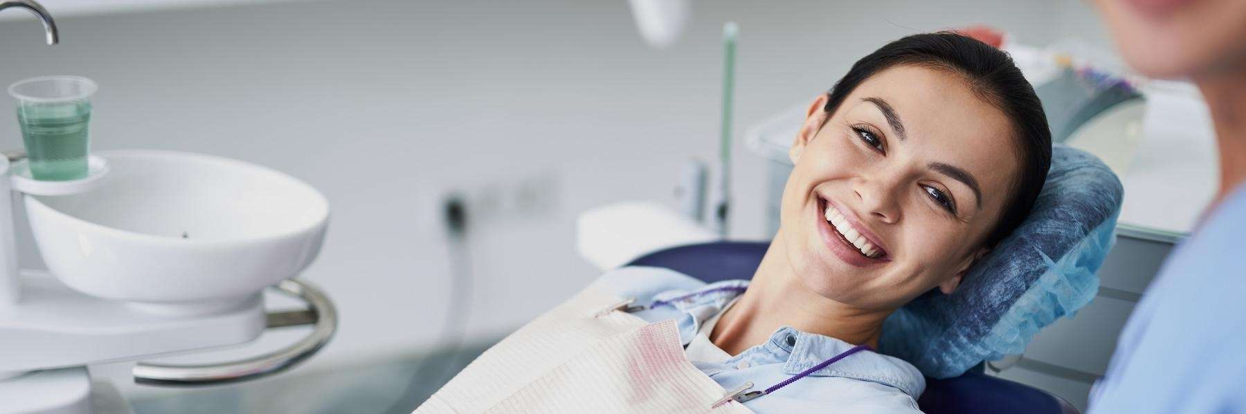 Woman in dental chair about to get holistic dental treatment, charlotte NC
