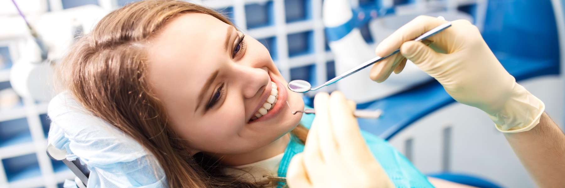 Woman at the dentist getting veneers in charlotte