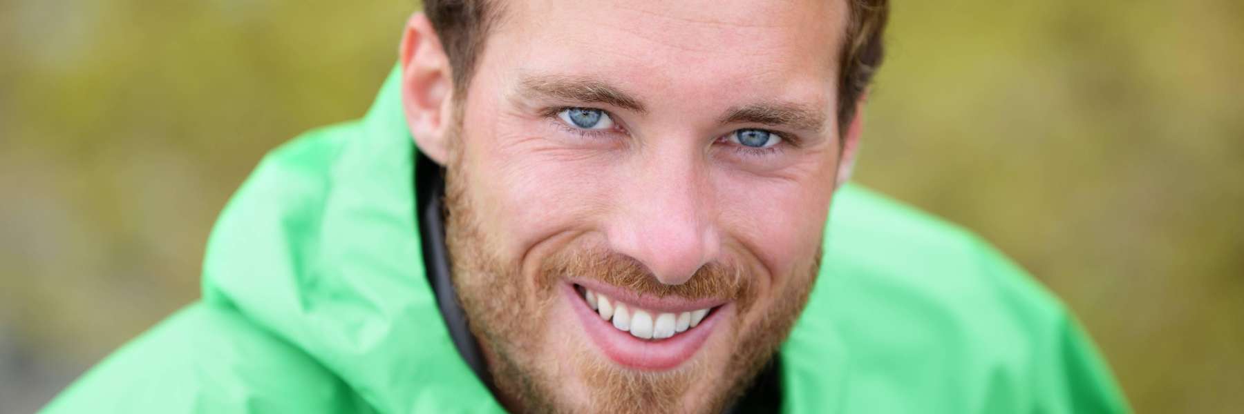 A man smiling outdoors | Charlotte Dentist
