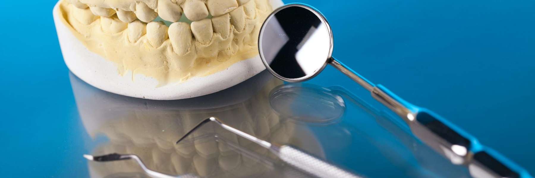 A dental mold and teeth cleaning tools