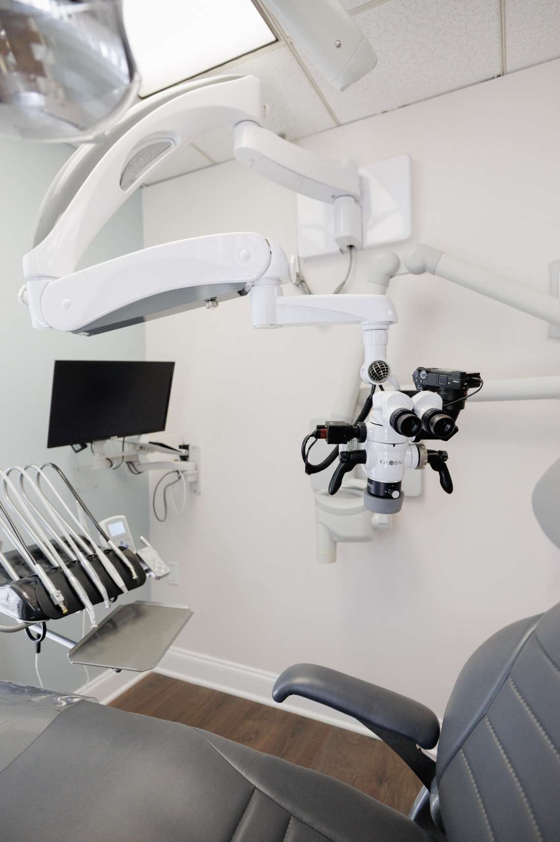 Microscope in a patient room of gentry dental, charlotte nc